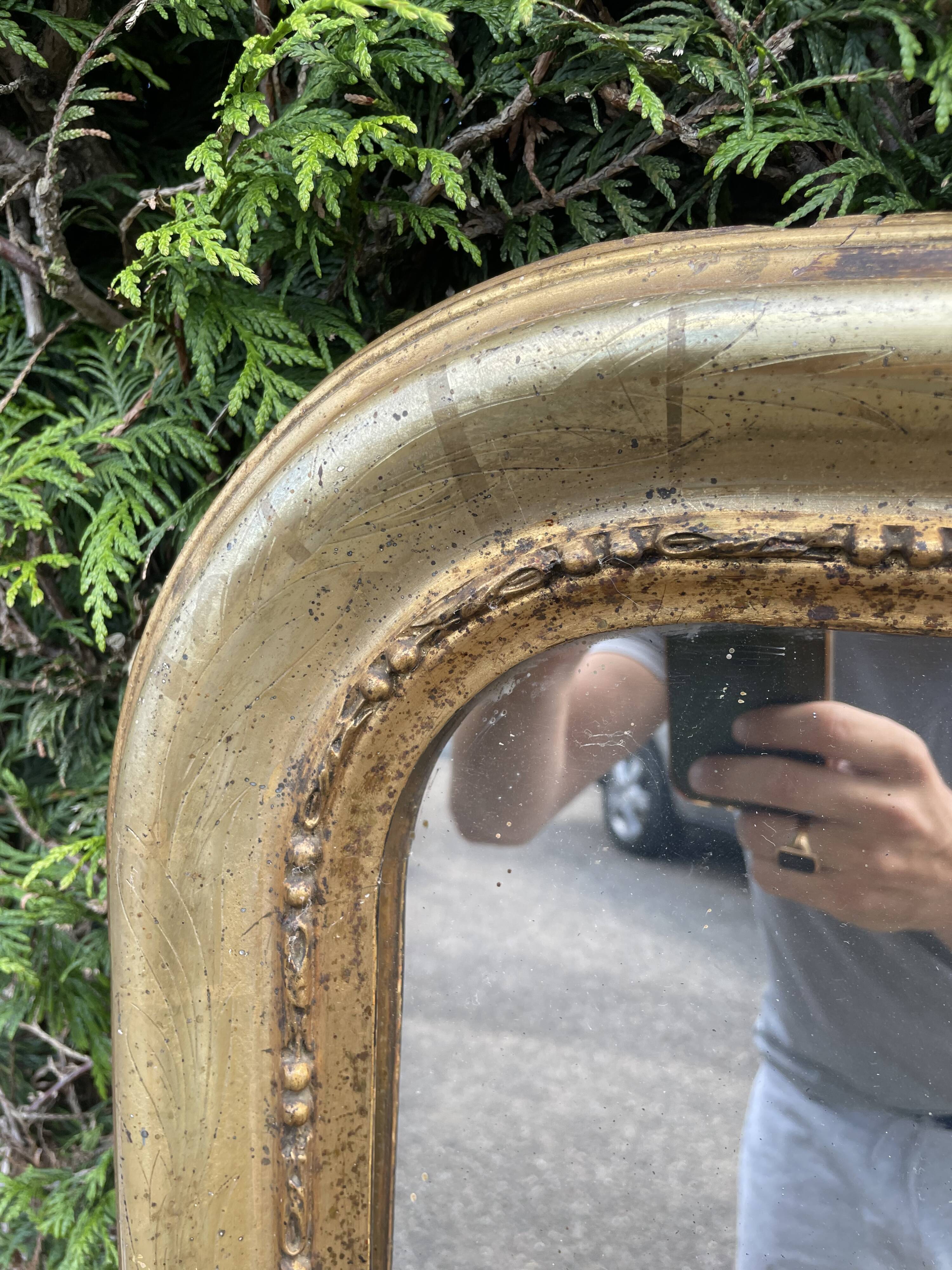 Louis Philippe period mirror with 19th gold leaf