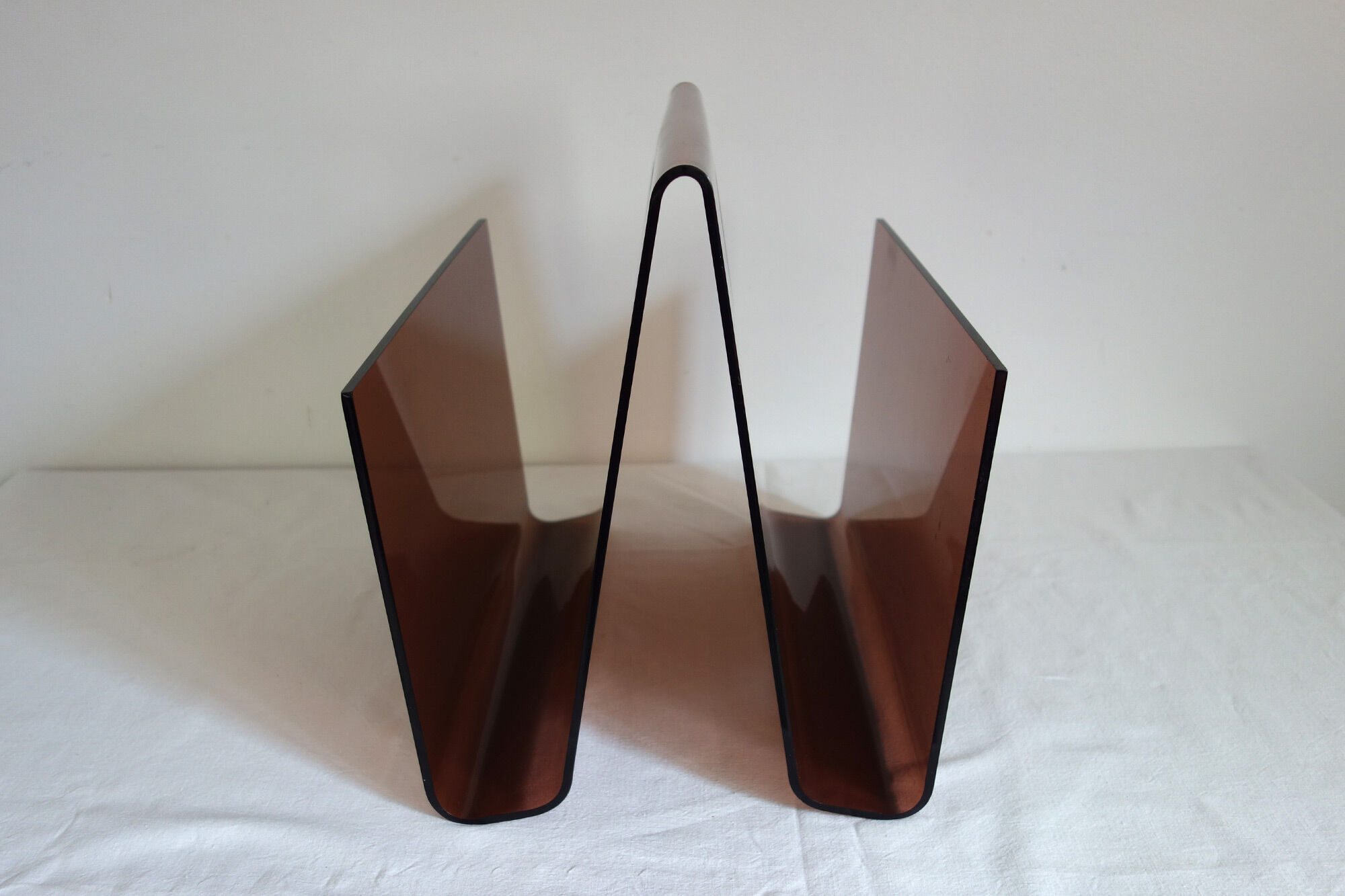 Smoked plexiglass magazine holder, 70s