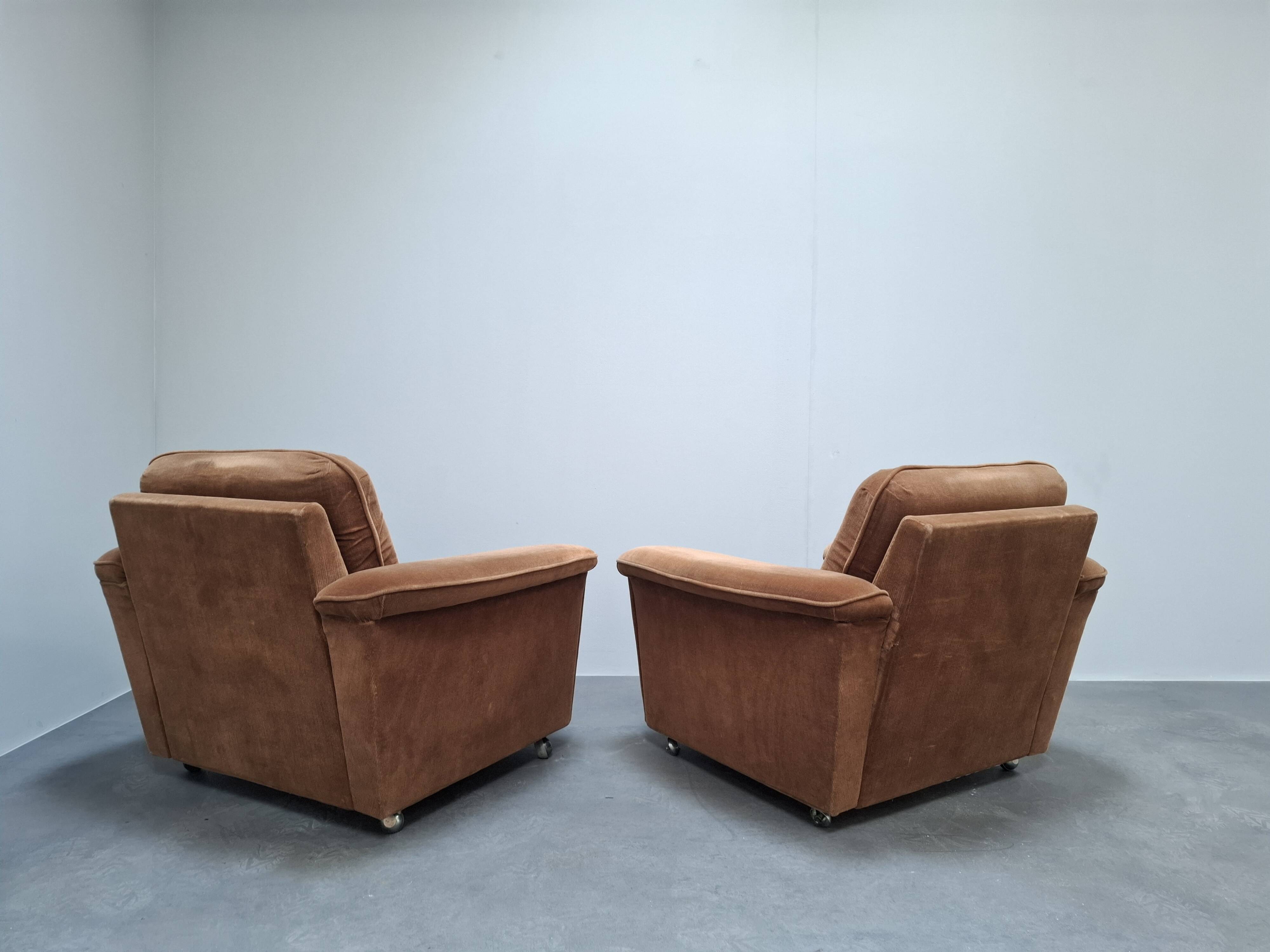 Pair of Mid-Century Modern Czech Lounge Armchairs with Rolling Casters
