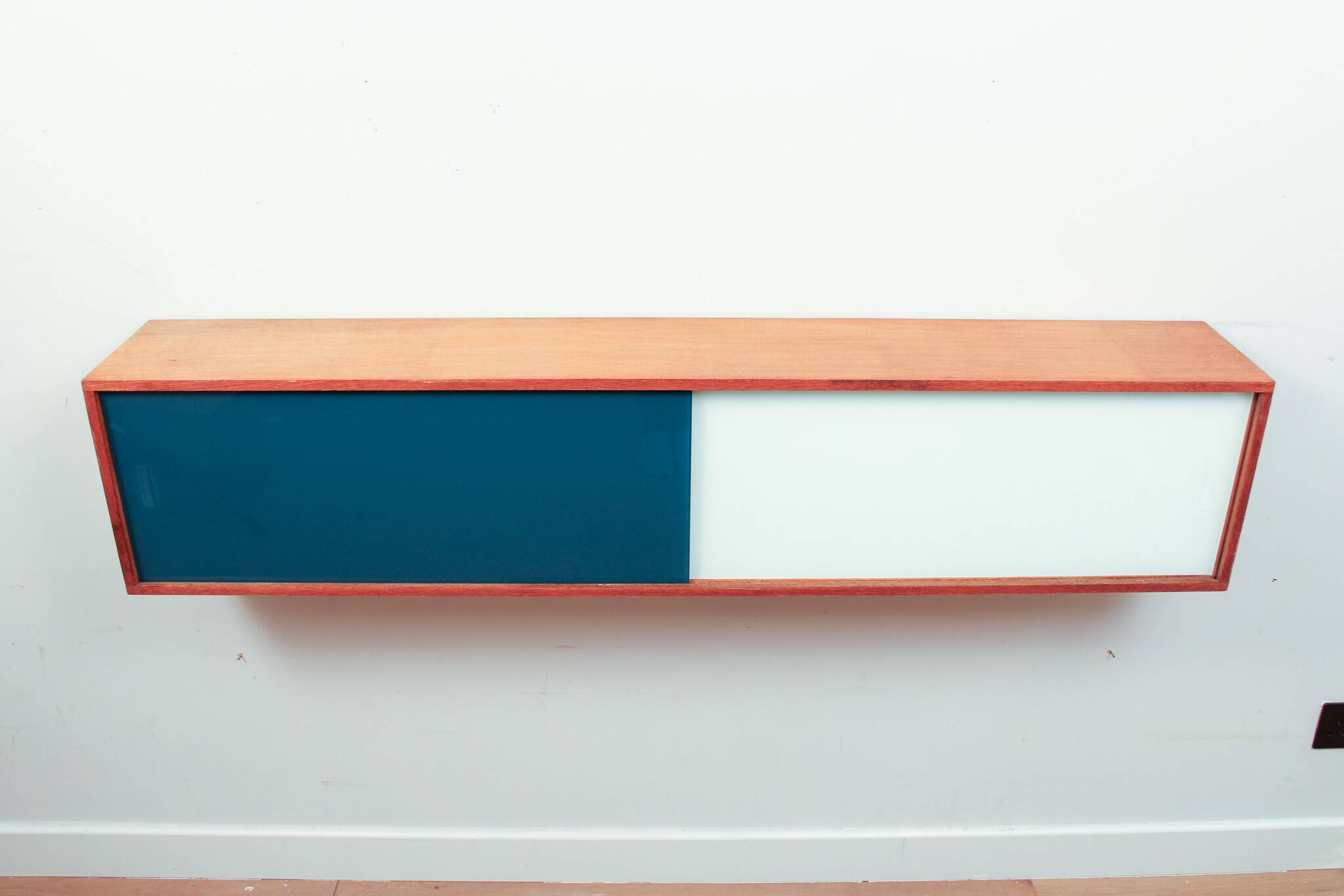 Vintage mid-century wall hung oak cabinets, blue & white sliding glass door