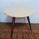 Vintage tripod side table in wood and formica.