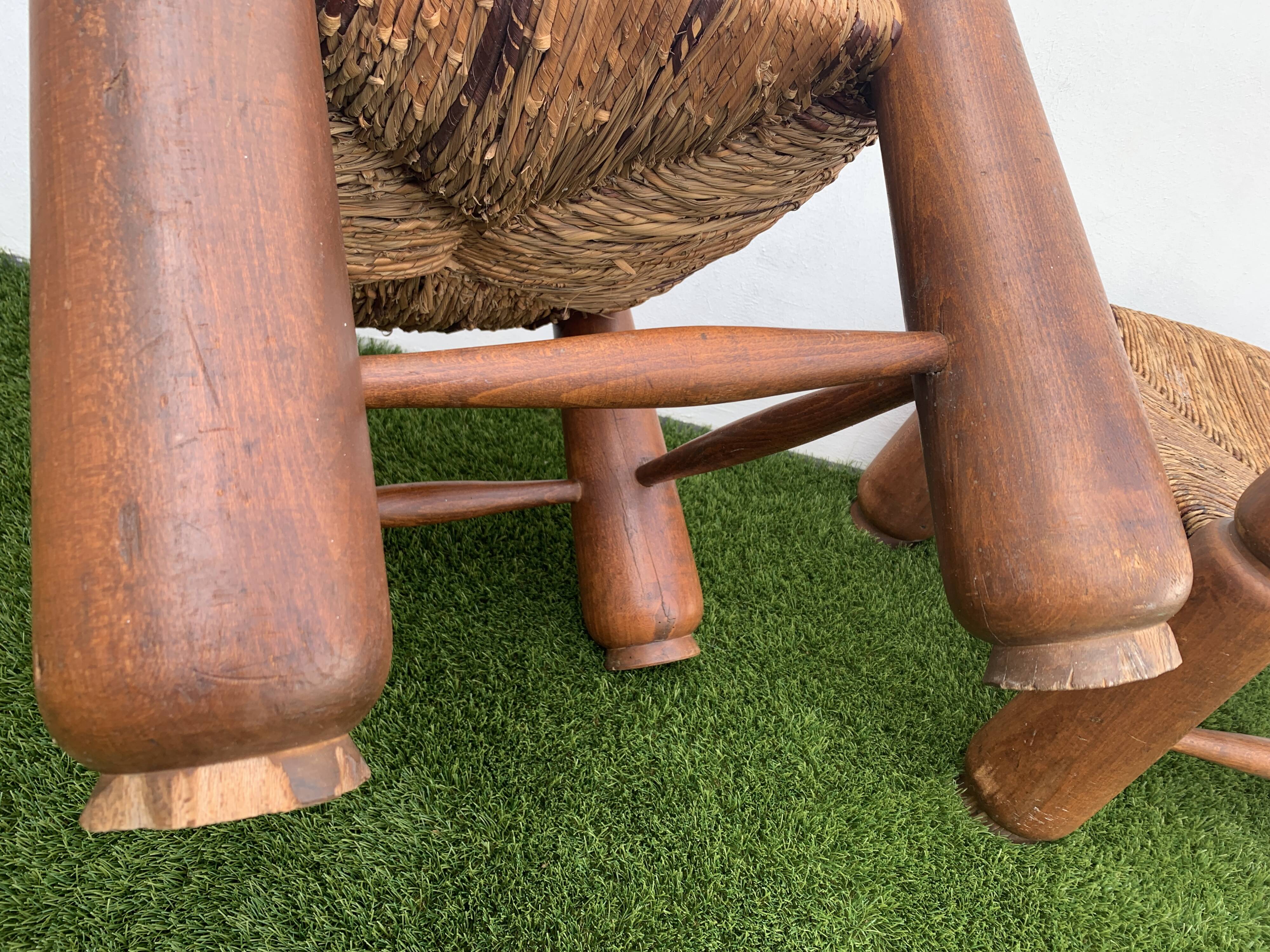 Pair of antique low fire chairs made of wood and straw
