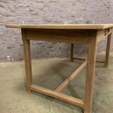 Old farm table in raw oak