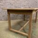 Old farm table in raw oak