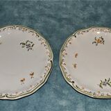 Two MOUSTIER cups decorated with flowers signed