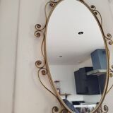 Oval mirror in gilded brass and floral horn, 1950s