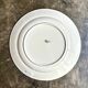 Longchamp round dish in iron earth, "Lily" service