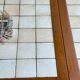 Vintage extendable dining table in wood and ceramic – 1970s
