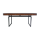 Wooden desk with drawers and black lacquered legs.