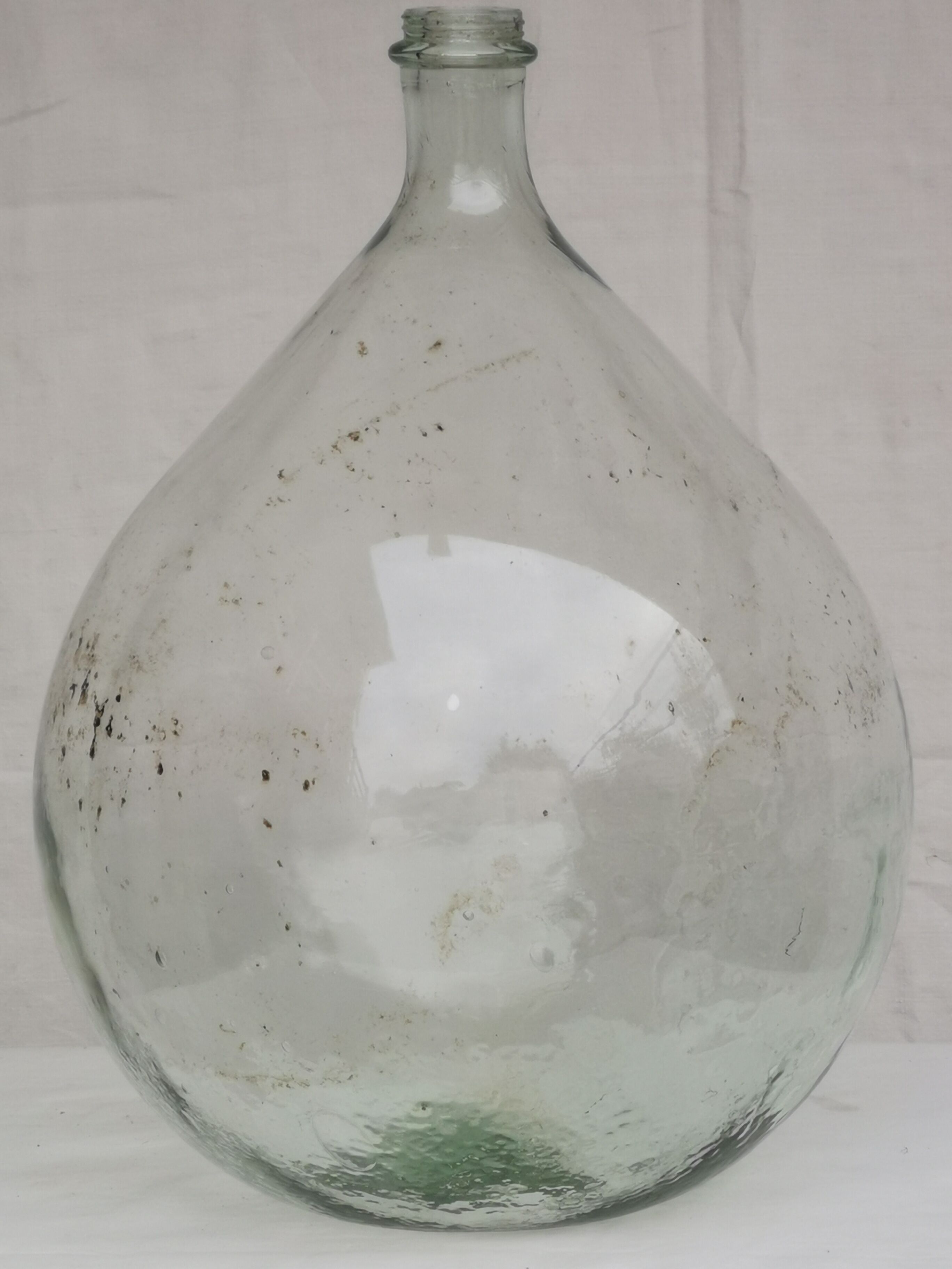 Large old lady Jeanne in transparent glass