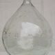 Large old lady Jeanne in transparent glass