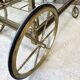Rolling bar cart in brass and bronze circa 1960