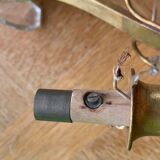 Art deco wall lamp with beveled stamps in gilded brass