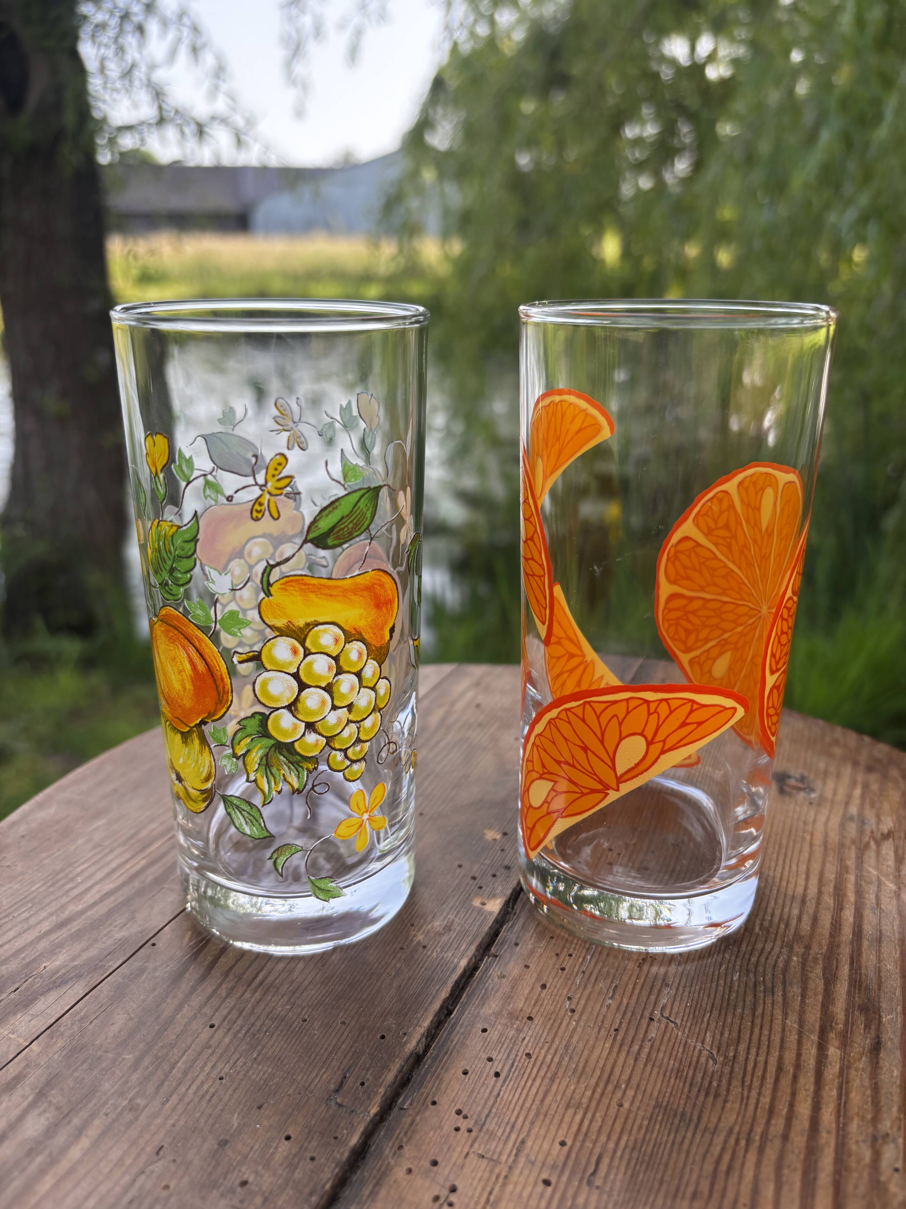 Vintage set of 4 fruit-decorated orangeade glasses.