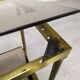 Golden brass sofa end