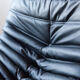 Armchair and ottoman in black leather model designed by Michel Ducaroy 1973
