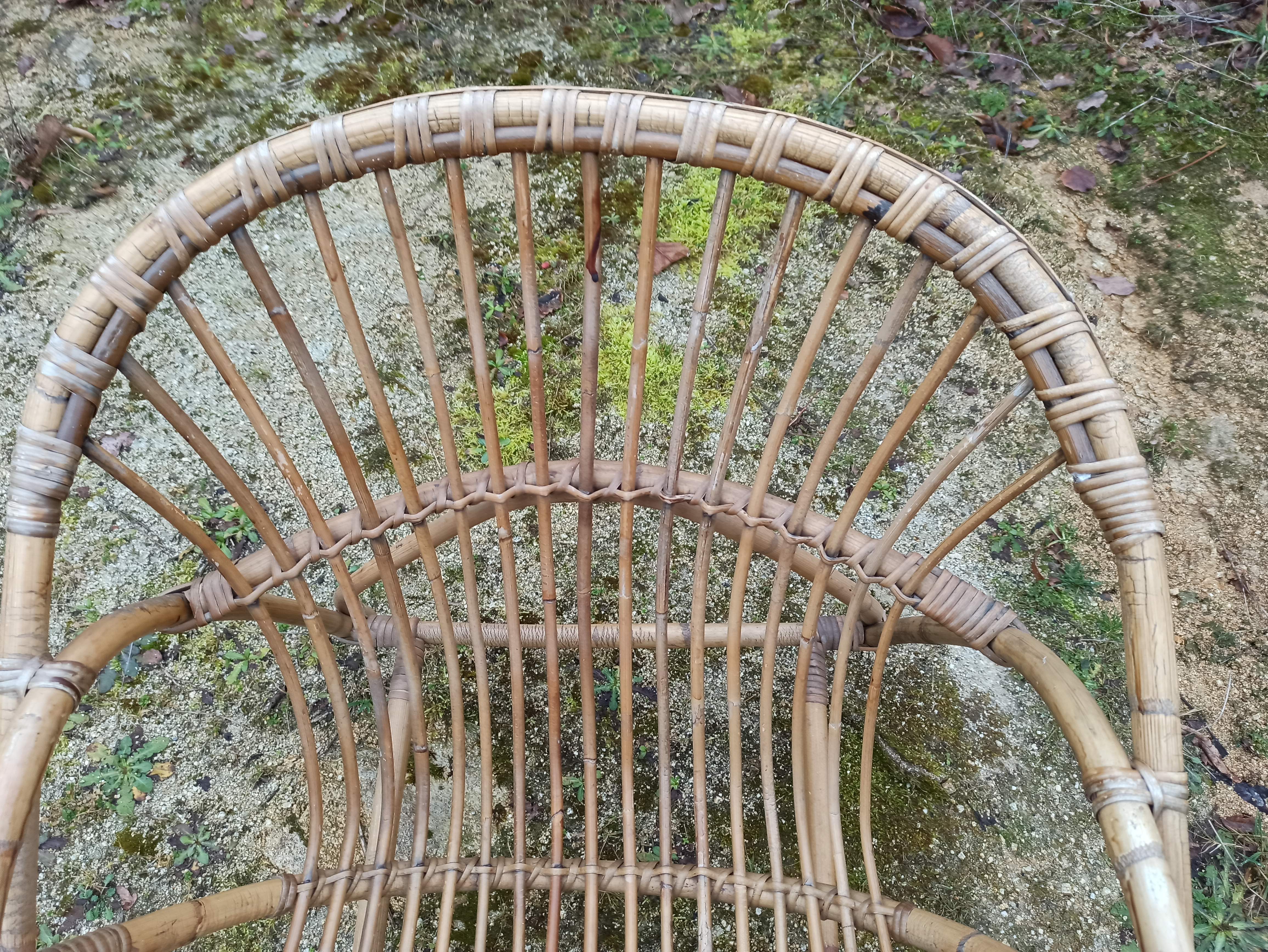 Rattan armchair with armrest