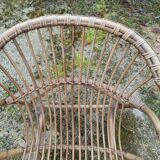 Rattan armchair with armrest