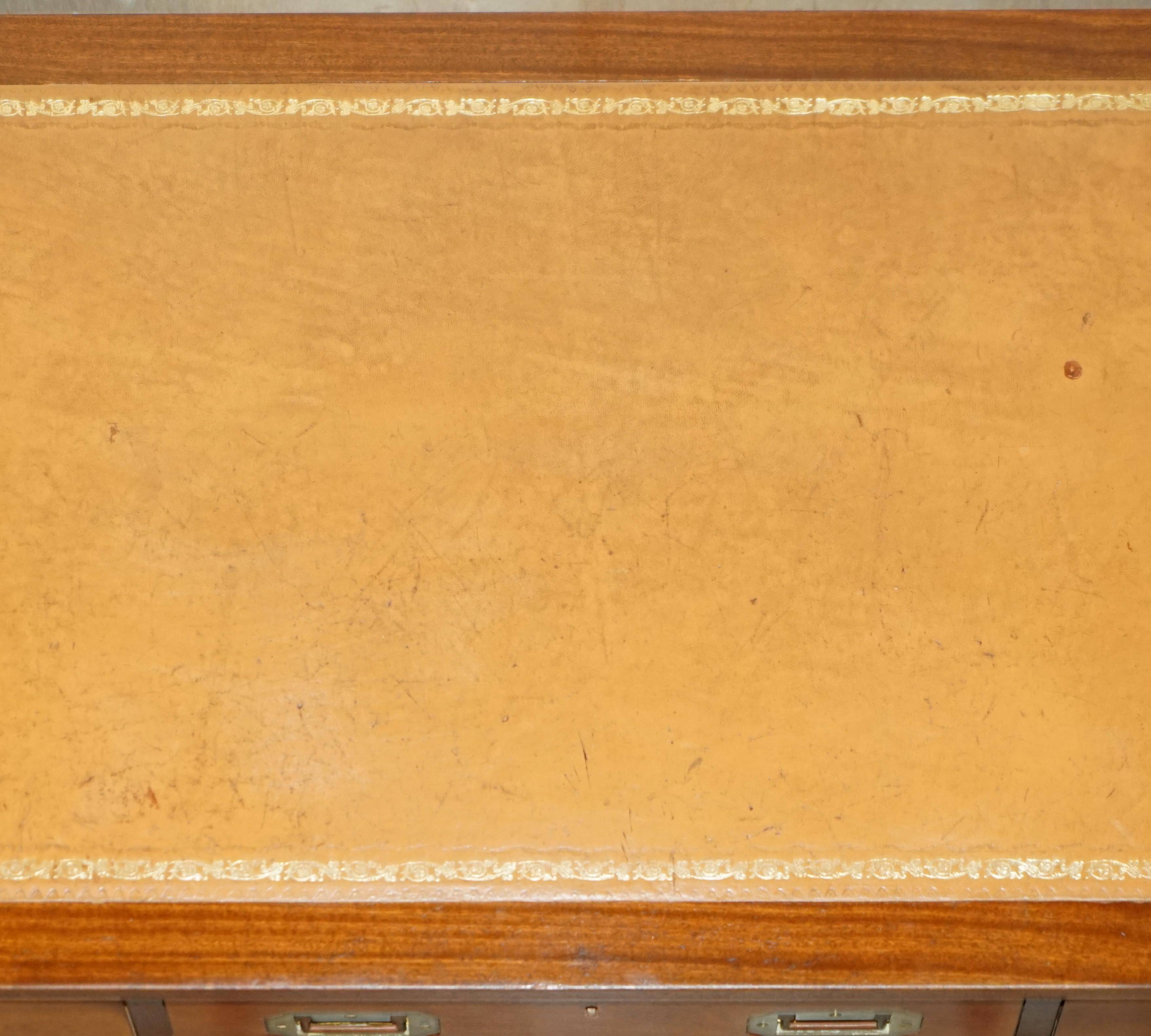 Vintage Harrods Kennedy desk in military campaign style with drawers.