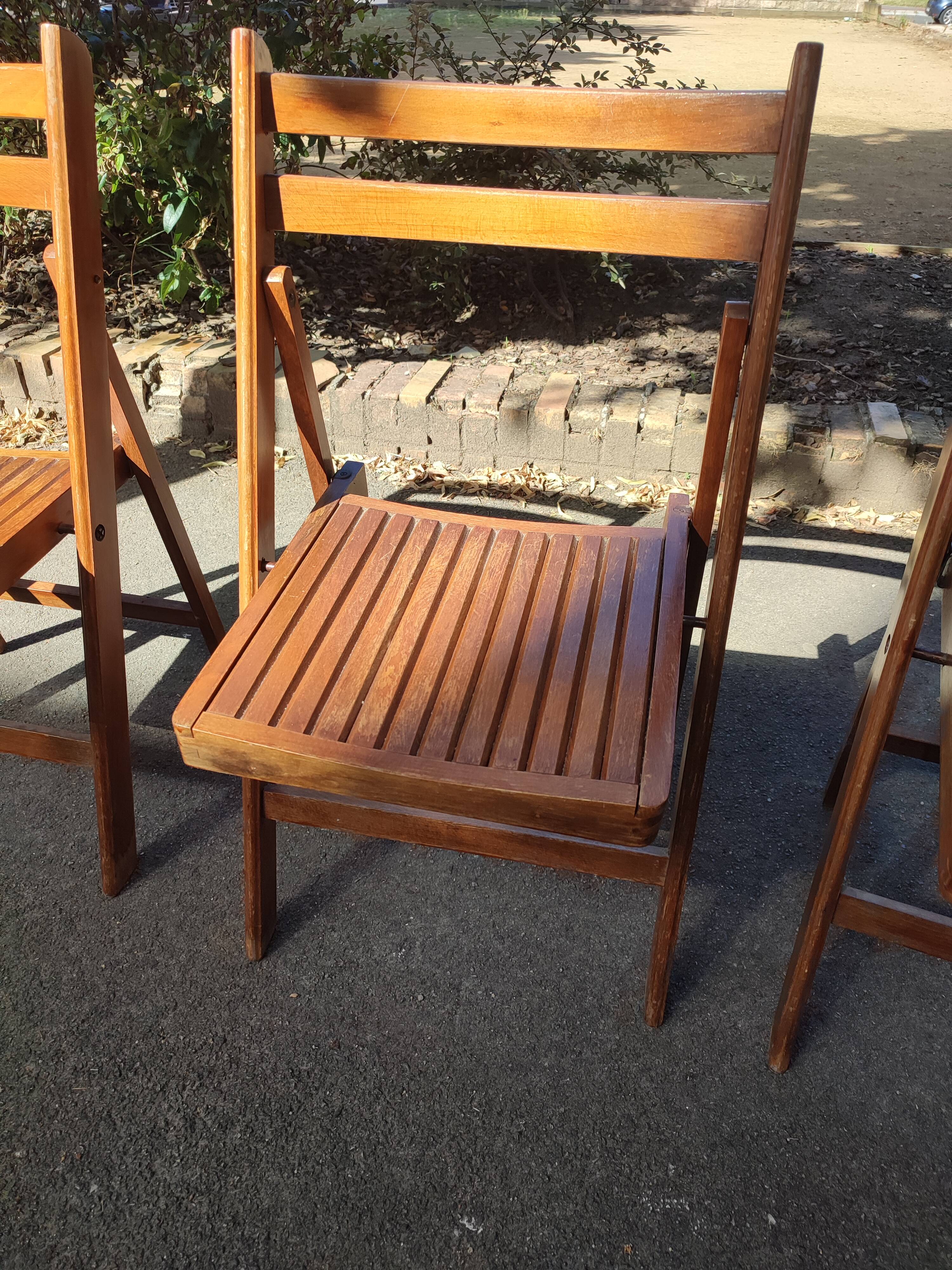 4 folding teak chairs