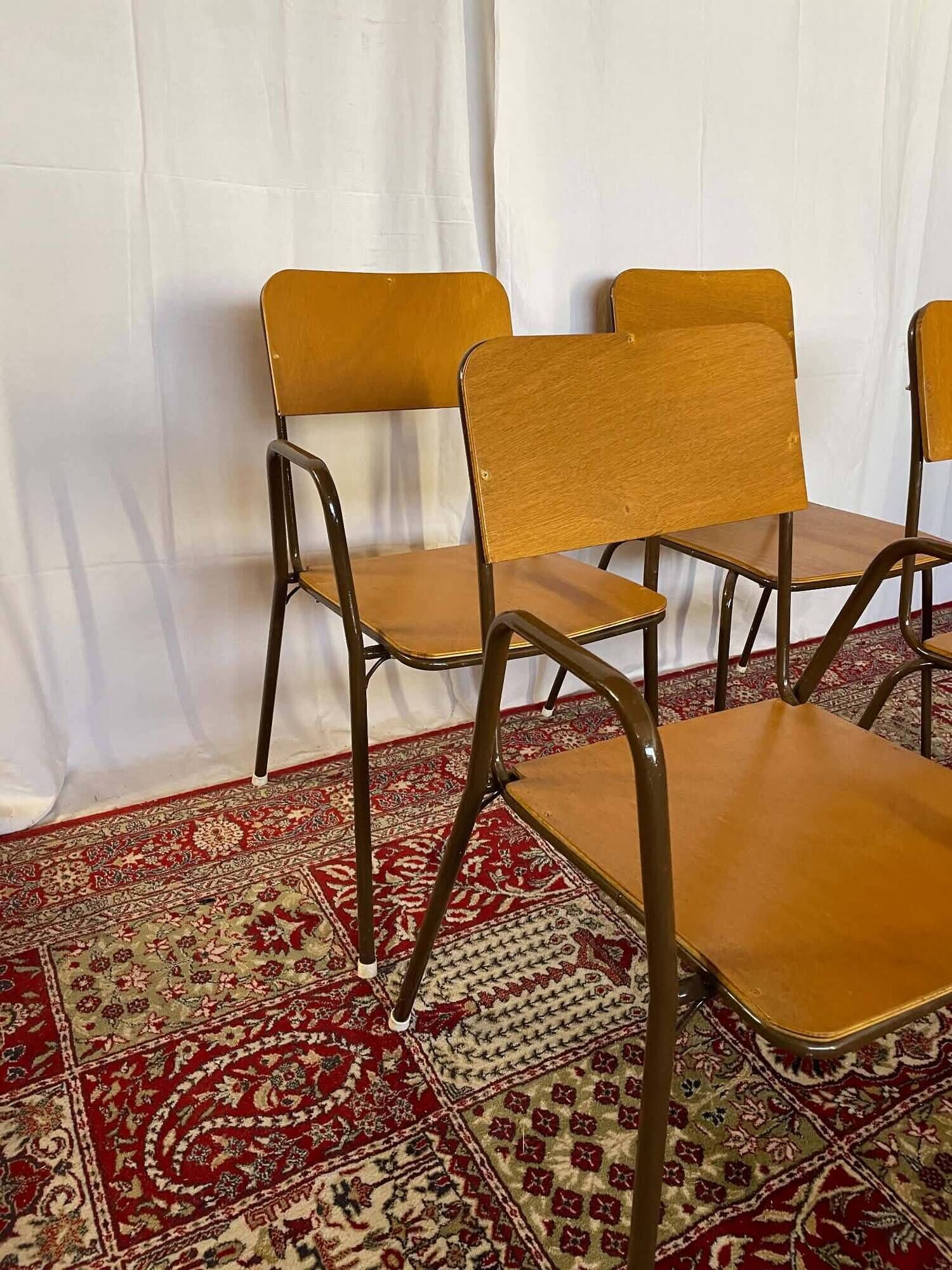 Set of 2 vintage school chairs and 2 armchairs.