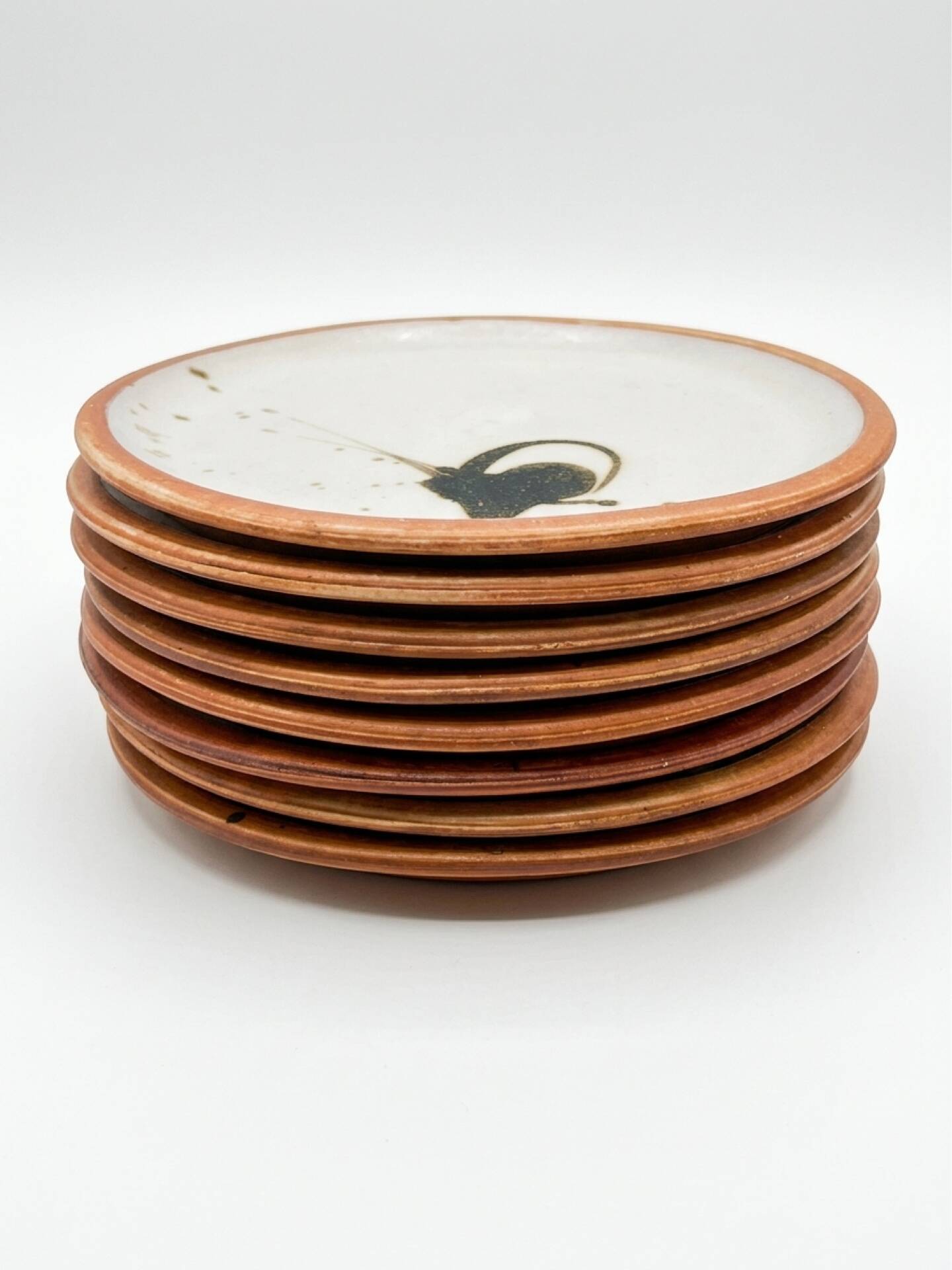 8 pottery plates from La Colombe