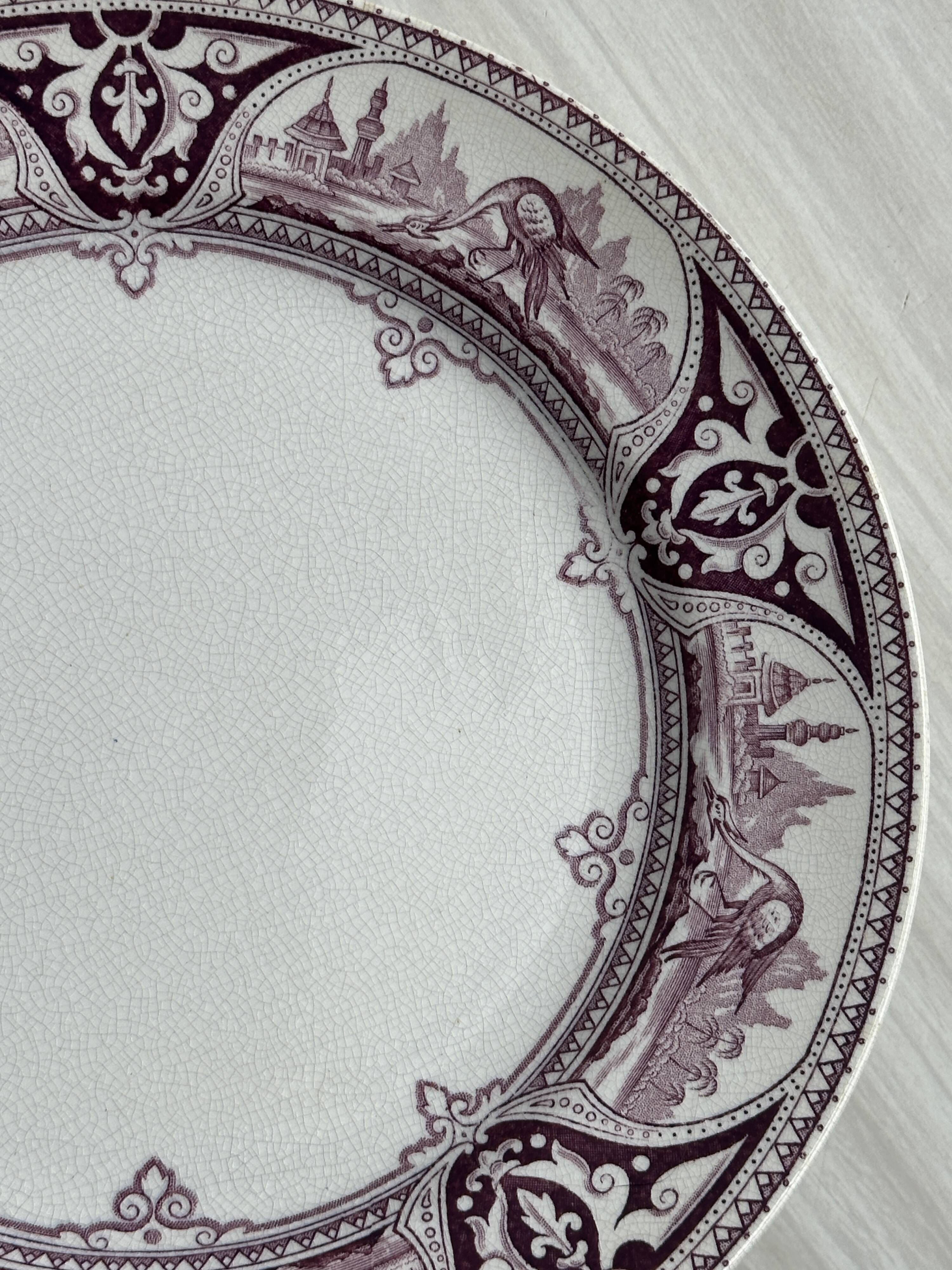 Antique plate with purple oriental decoration