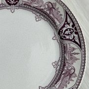 Antique plate with purple oriental decoration
