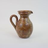 Brown speckled stoneware pitcher in very good condition
