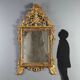 Antique mirror in gilded lime wood, Baroque sculptures, 18th century