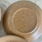 4 hollow plates in speckled stoneware