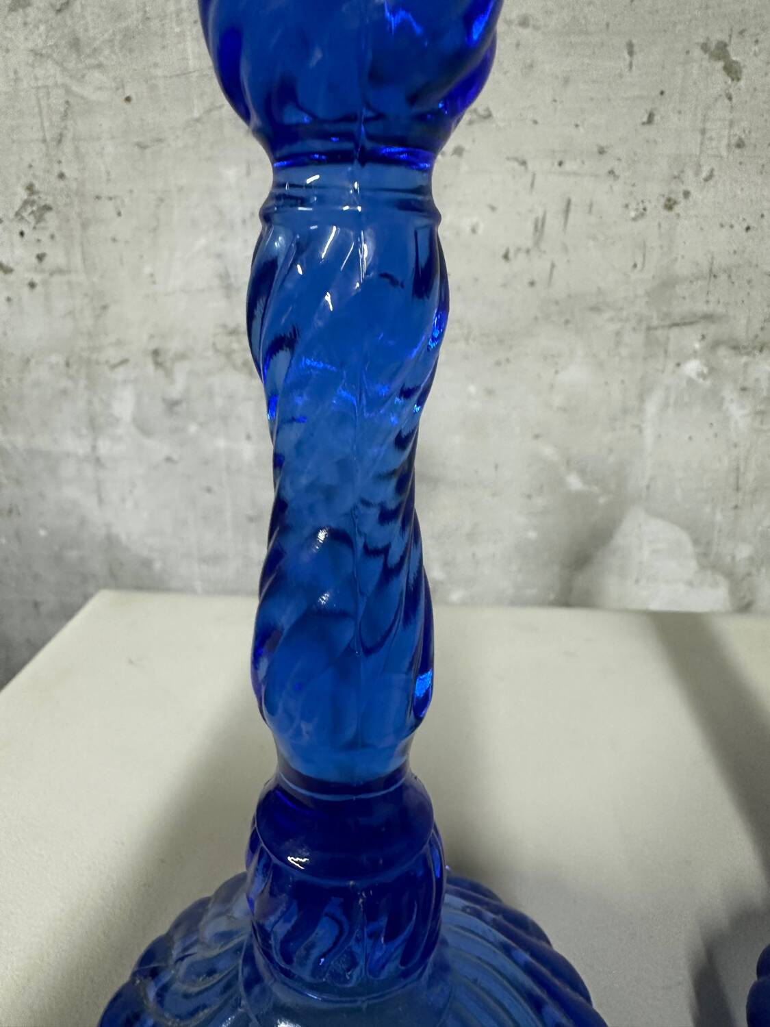 Pair of vintage cobalt blue twisted glass candlesticks h 24.5 cm