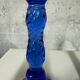 Pair of vintage cobalt blue twisted glass candlesticks h 24.5 cm