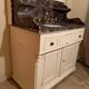 Bathroom furniture, marble top, simple vasque and vintage faucet