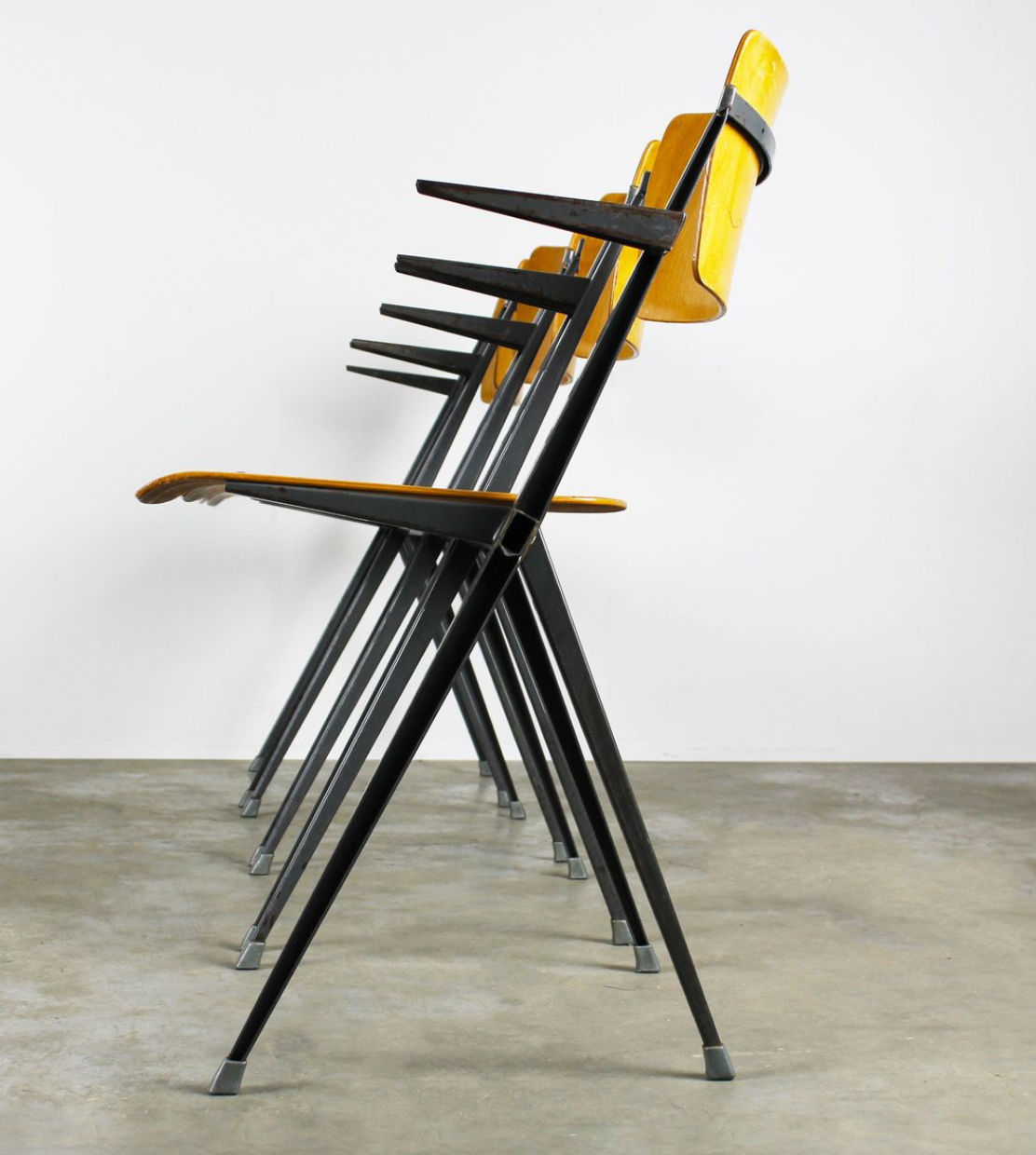 Vintage Pyramid chairs with armrests by Wim Rietveld