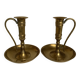 Pair of brass cellar rat candlesticks