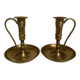 Pair of brass cellar rat candlesticks
