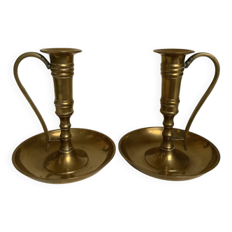 Pair of brass cellar rat candlesticks
