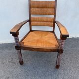Vintage armchair in straw and brutalist wood