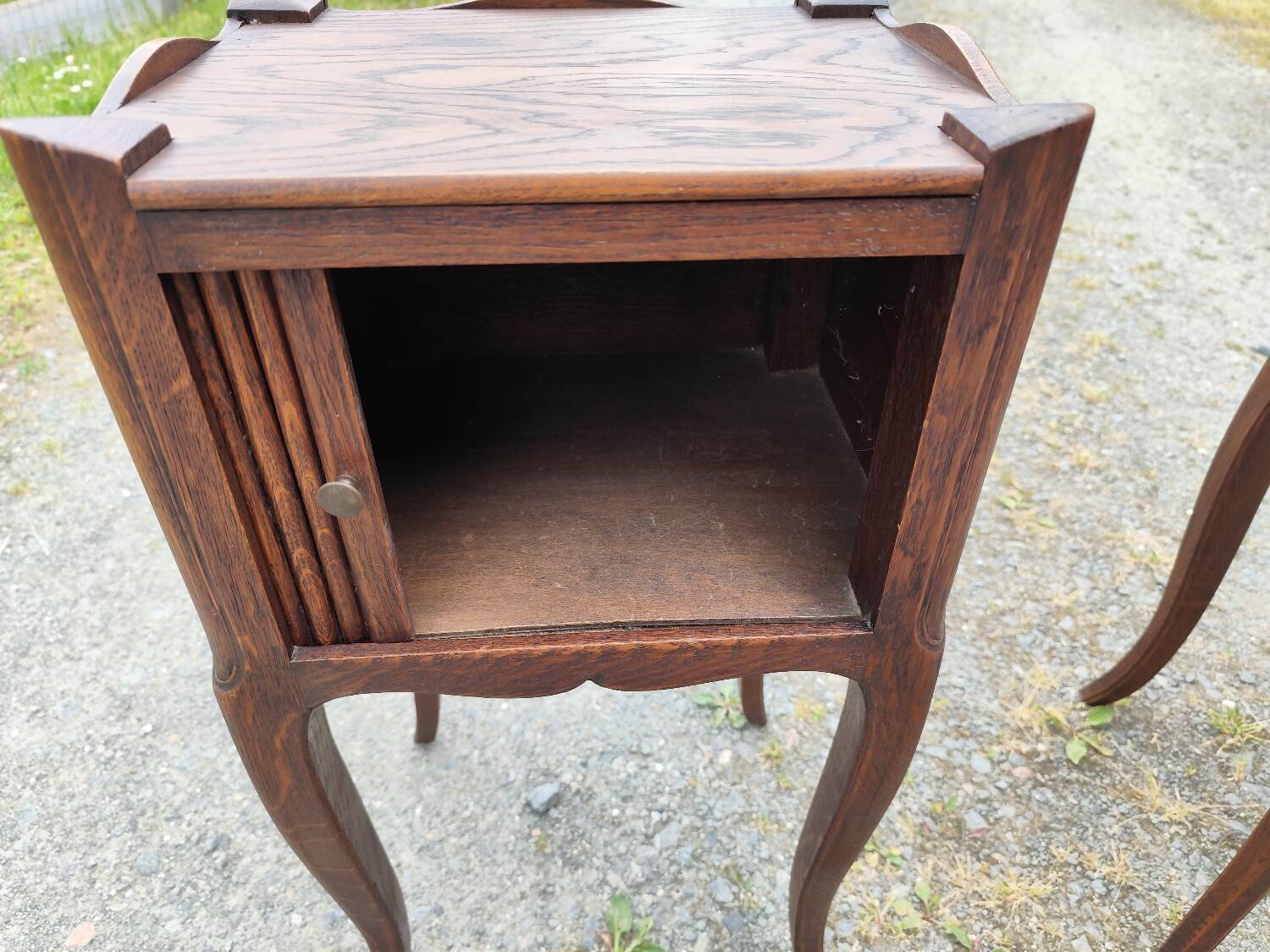 Pair of oak bedside tables with curtained niche doors