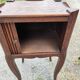 Pair of oak bedside tables with curtained niche doors