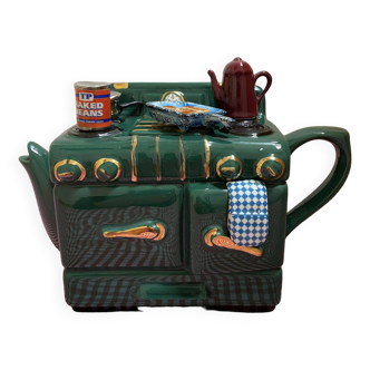 Théière porcelaine de forme originale en forme de cuisinière. Marque anglaise Teapottery.