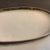 Old dish mounted in ceramic, scallop