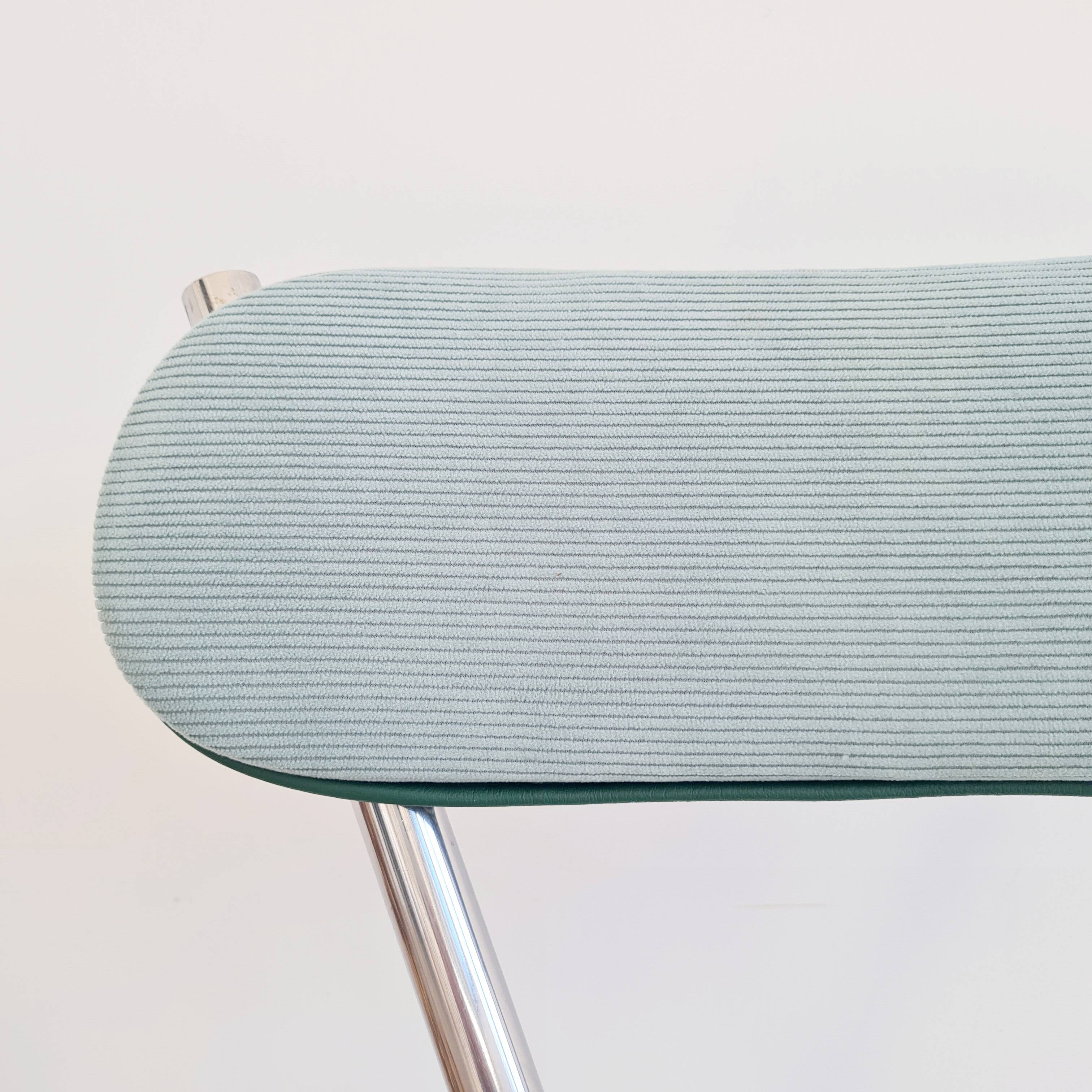 Old chrome metal and blue velvet chair