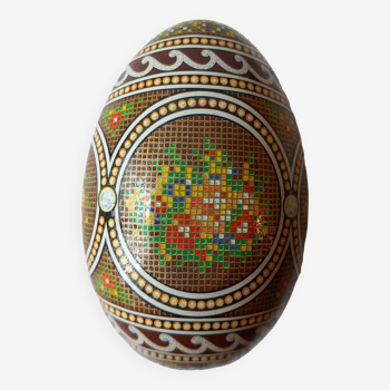 Decorated metal egg- box.