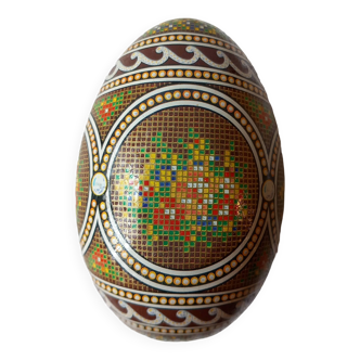 Decorated metal egg- box.