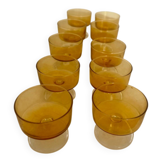 Set of 10 vintage Luminarc Cavalier amber glass champagne flutes.