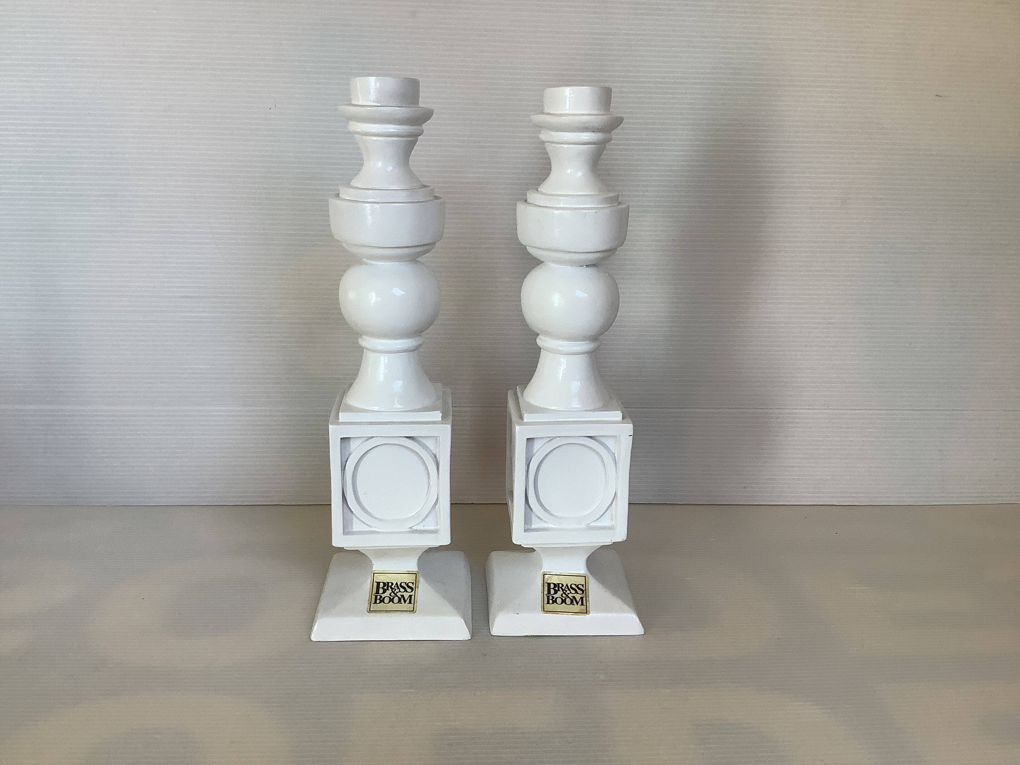 Pair of white resin candle holders