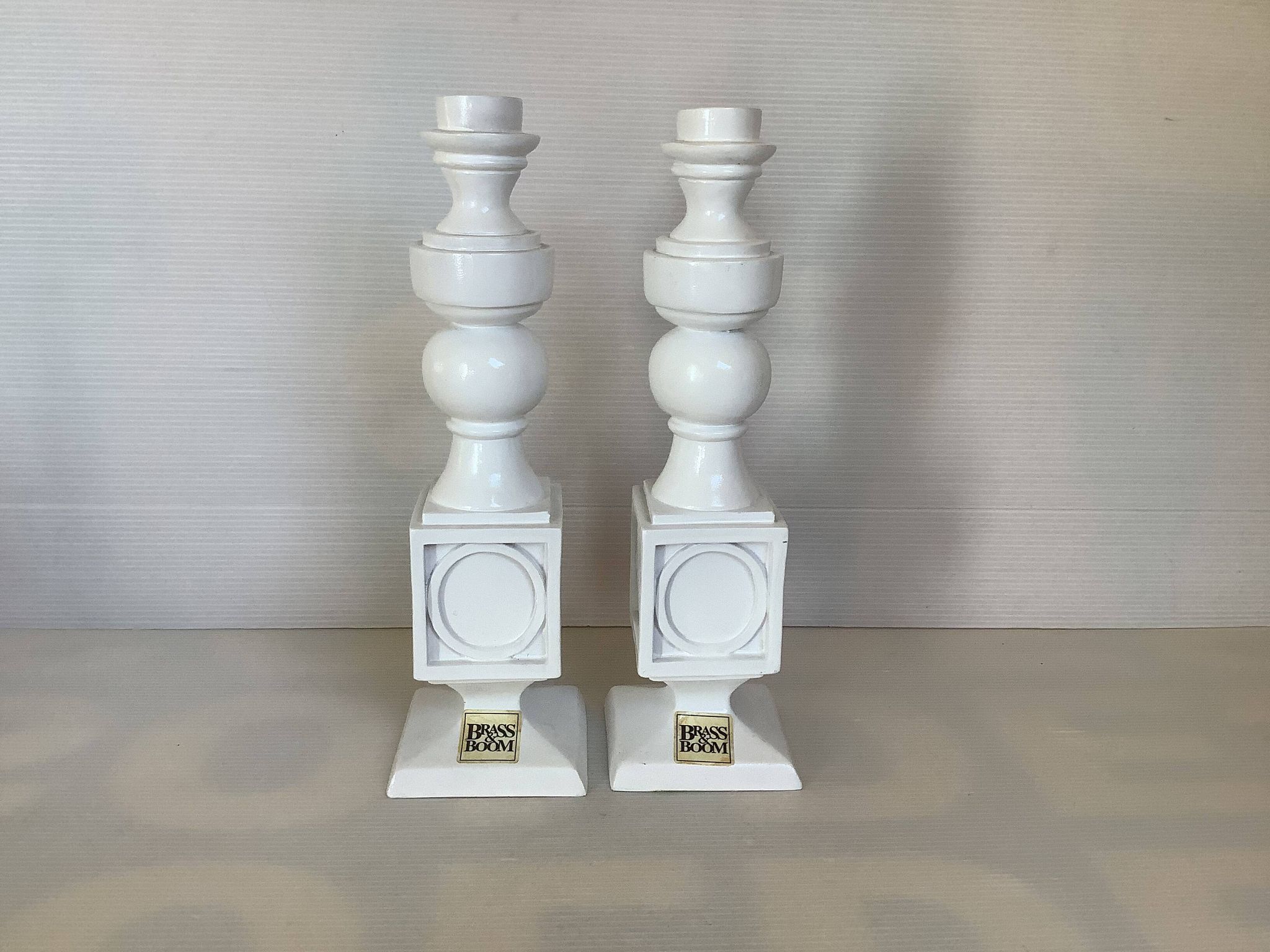 Pair of white resin candle holders