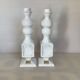 Pair of white resin candle holders